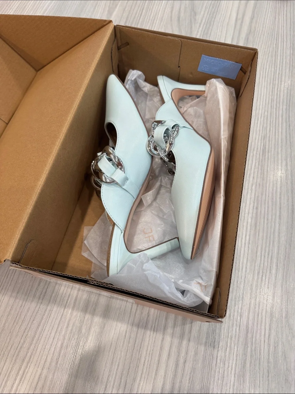 Elegant Light Blue Pointed Toe Heels with Chain Accent